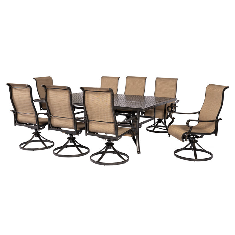 Sweeten 9 Piece Dining Set with 8 Swivel Rocker Chairs and 60 x 84 in. Table