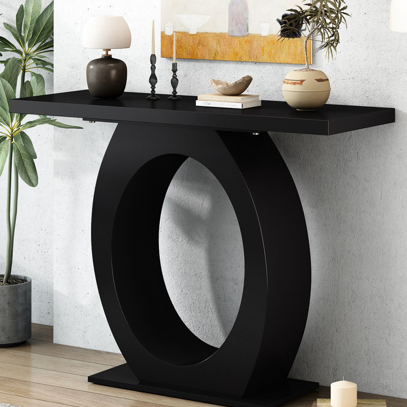 Console moderne, base en forme d'œuf. Noir + décor intérieur. 38,58 po Profondeur, 15,61 de largeur, 33,02 de hauteur. Table de soutien exceptionnelle avec base de poids et design épuré pour un salon polyvalent