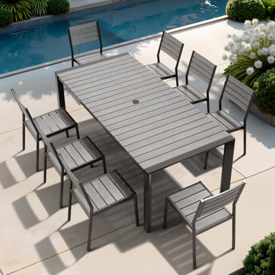 8 - Person 84'' W X 39'' D Rectangular Aluminum Dining Set with Stackable Chairs