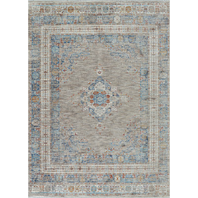 Tapis bleu frangé Mizic