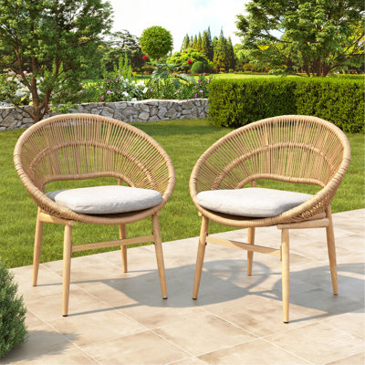 Cyril Outdoor Wicker Papasan Style Dining Chair, Teak Finished Leg And Light Brown Faux Rattan, Beige Cushion, Set Of 2