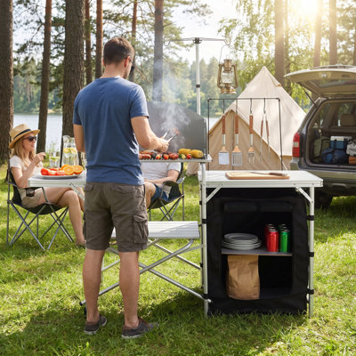 Camping Kitchen Table with Detachable Windscreen, Portable Folding Outdoor Cook Station with Storage Cabinet & Side Tables, Heavy Duty Camp Prep Table for RV Travel, Picnic, Family Party, Silver