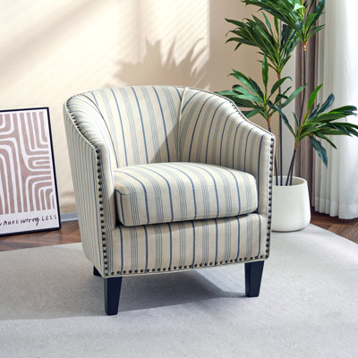 Fauteuil demi-tonneau rembourré à rayures