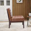 Fauteuil d'appoint capitonné en similicuir avec pieds en bois massif