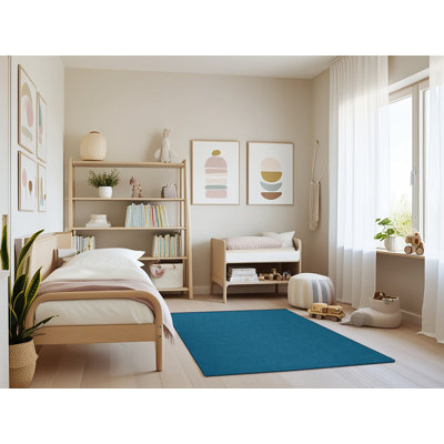 Tapis bleu uni lavable à la machine