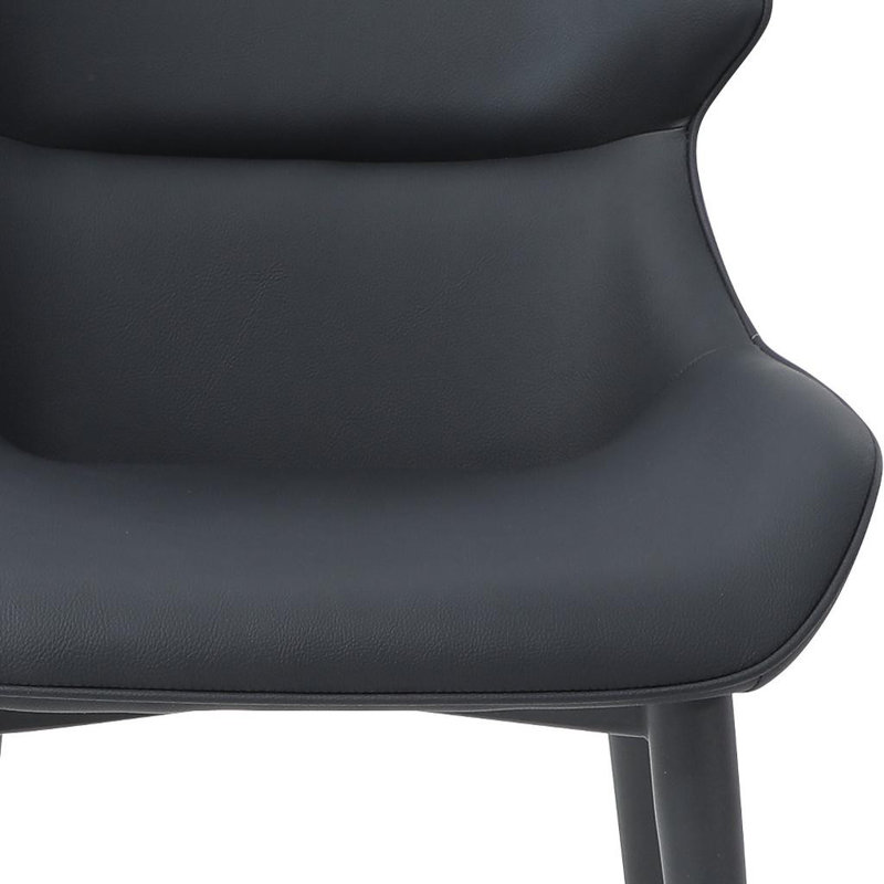 Chaise d'appoint en similicuir noir et dossier à oreilles en acier