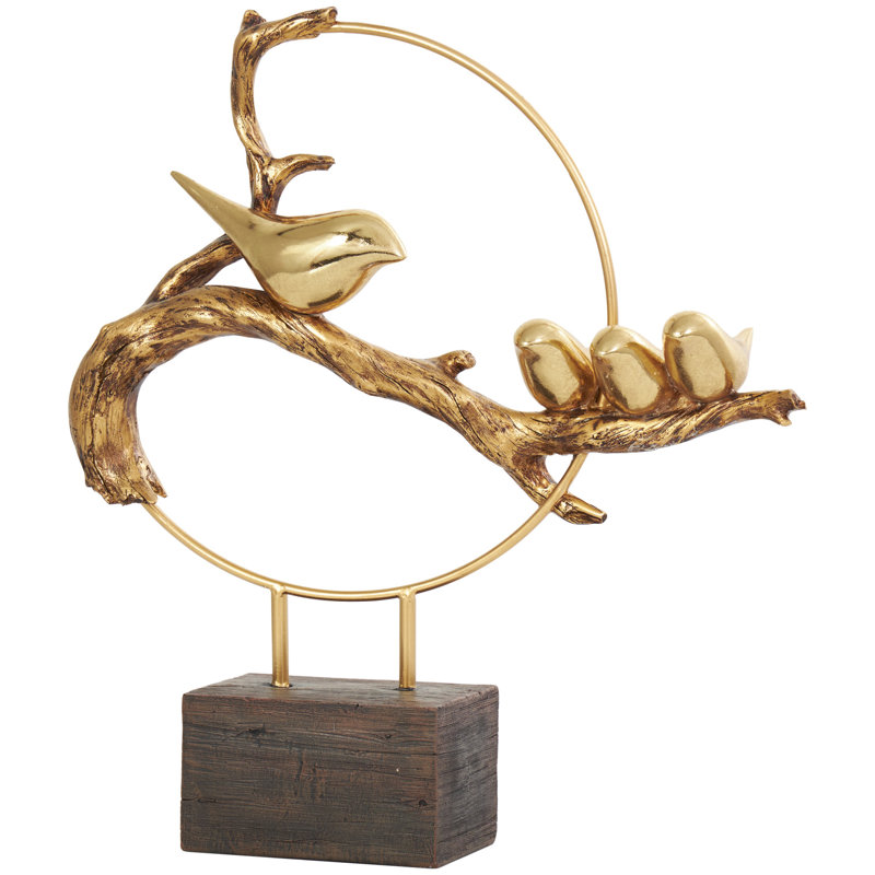 Sculpture en pierre polystone sur une branche