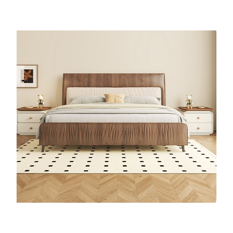 Table de chevet minimaliste de couleur crème, avec des tiroirs en bois massif et des rails coulissants silencieux, convient à une utilisation dans la chambre à coucher.