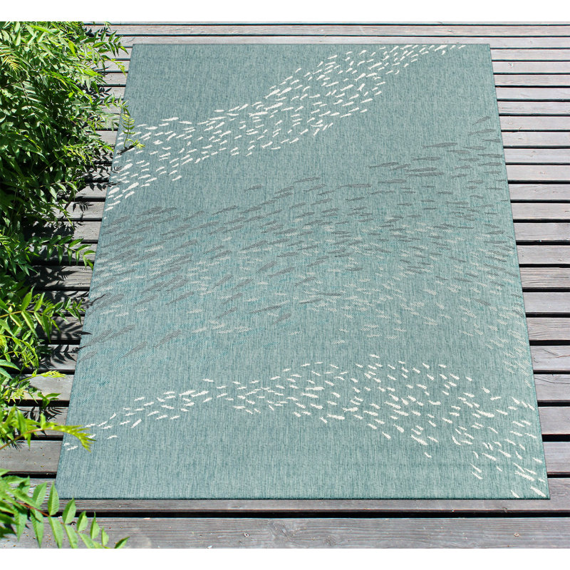 Tapis bleu turquoise tissé à la machine