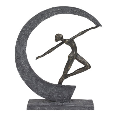 Figurine dansante avec croissant de lune