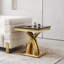 Table de bout noire et dorée avec base polie en forme de X