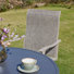 Nectaria Round 6 - Person Outdoor Patio Dining Set with 6 Swivel PVC-coated polyester Chairs