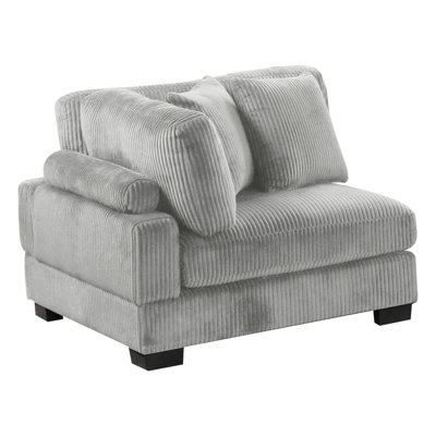 Coussin de coin contemporain en velours côtelé gris soutenu par du bois, confort d'assise mi-ferme, dossier rembourré et apparence sans accoudoirs pour les espaces de vie dans une esthétique moderne avec structure en bois, douceur, disposition A