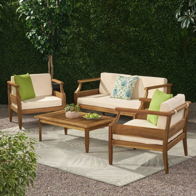 Ensemble de causeuse à 4 places avec table basse en teck et coussin crème