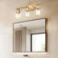 Éclairage pour meuble-lavabo Koos Gold