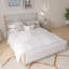 Base de lit tapissier moderne avec tête de lit capitonnée et pieds en bois massif de style moderne Mid-Century-109686825