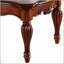 Table basse en cerisier rectangulaire avec pieds tournés, élégance intemporelle et grande surface pour le décor et la fonctionnalité.