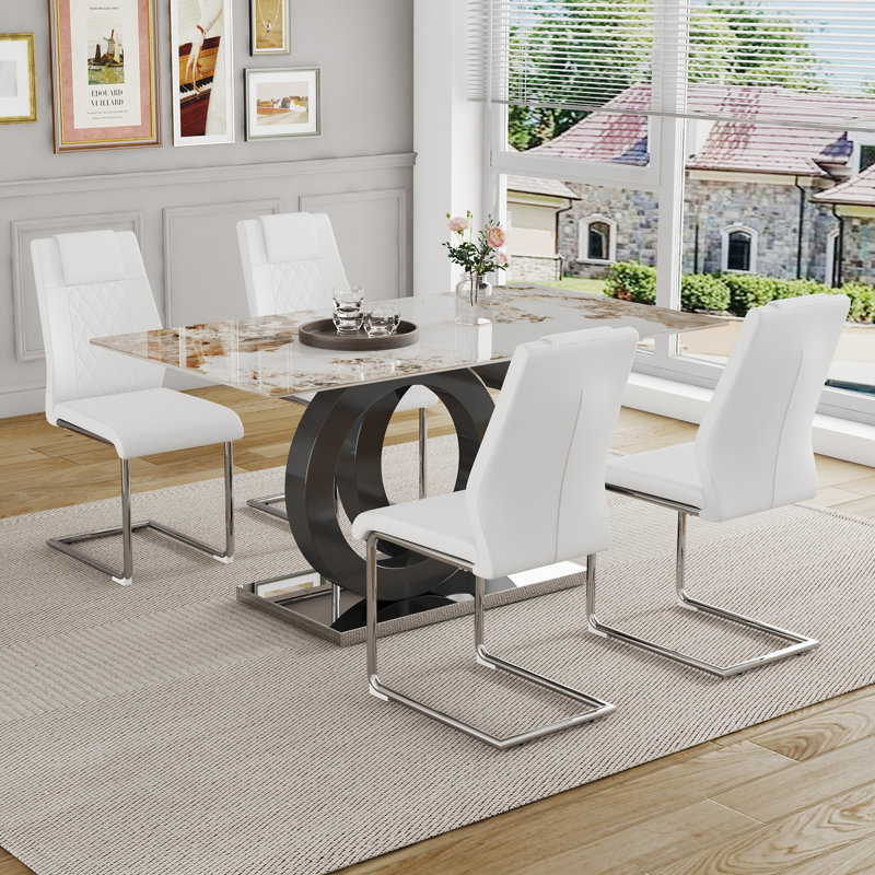 Ensemble de salle à manger: table en pierre frittée en marbre de 63 po x 31,5 po avec support en MDF en forme de O, jumelée à 4 chaises en polyuréthane blanc et pieds en métal argenté, parfaite pour les cuisines et les salles à manger