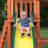 Backyard Discovery Tucson Cedar Wood Swing Set with Wave Slide, Play Deck, Rock Wall Ladder, and Snack Bar Window