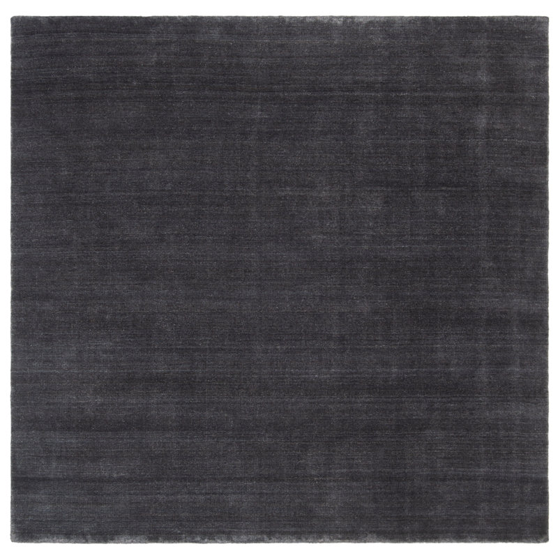 Addisyn Hand Tufted Wool/Cotton Solid Color Rug in Black, Rectangle 6' x 9'