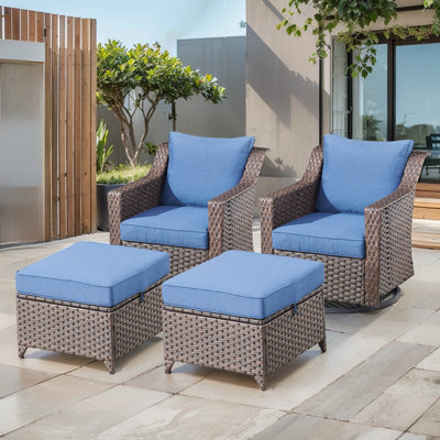 Chaises berçantes pivotantes en rotin avec coussins et repose-pieds Tya