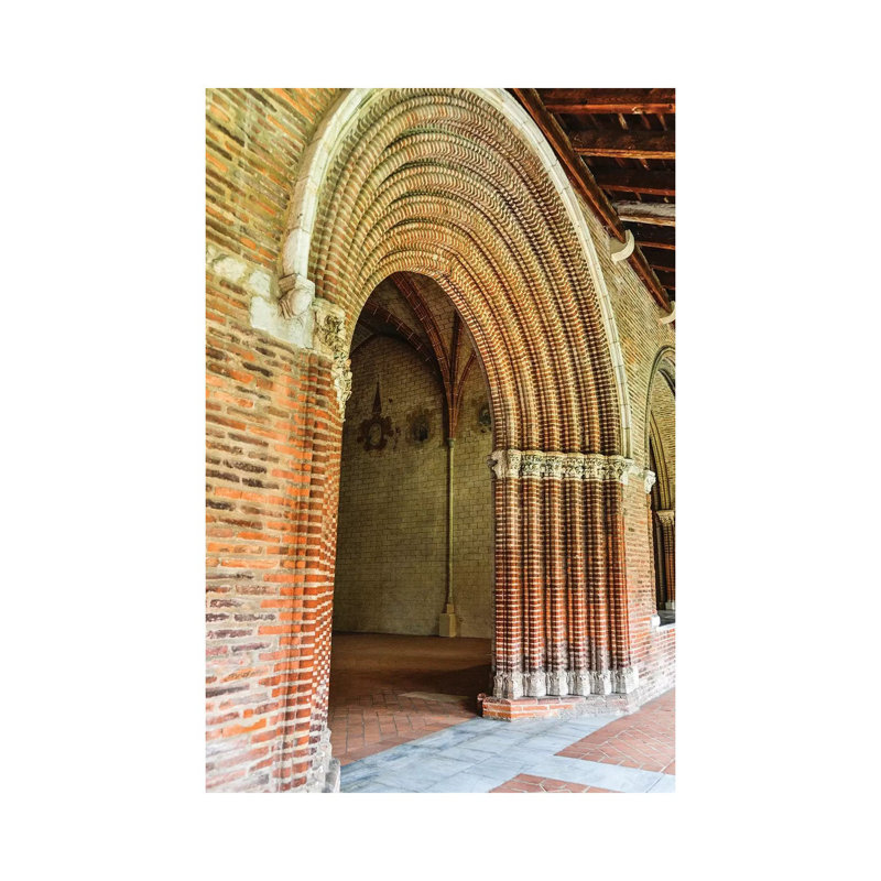 Arched Entrance To The Courtyard, Church Of The Jacobins, Toulouse, France by Hollice Looney - Wrapped Canvas Print