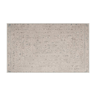 Tapis beige lavable à la machine