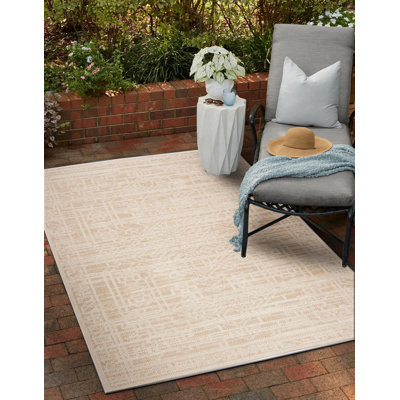 Tapis intérieur / extérieur en polypropylène beige / blanc Sadowski