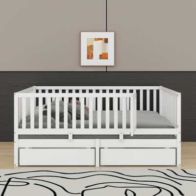 Wood Daybed With Fence Guardrails And Drawers by Harriet Bee