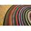 Tapis rond tressé antique à motif circulaire