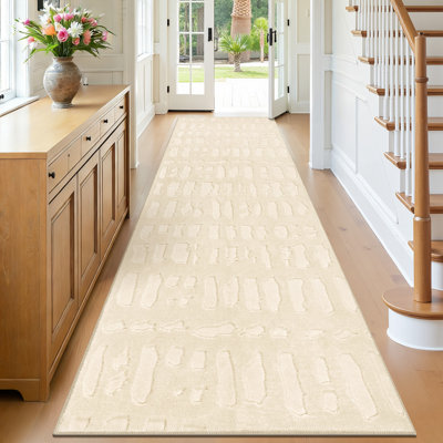 Tapis ivoire moderne en velours moelleux et moelleux
