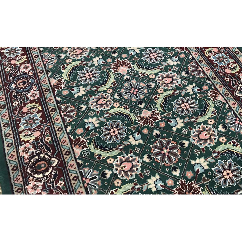 Tapis vert, noir et bourgogne de haute qualité noué à la main