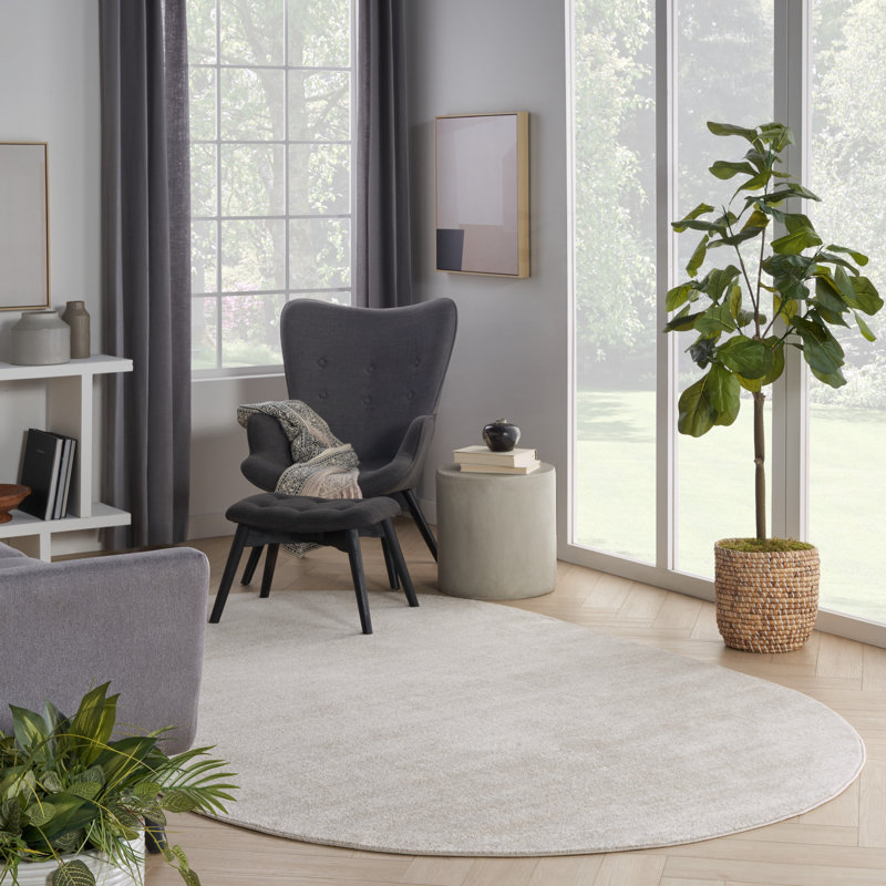 Mullican Sandy Solid Ivory/Beige Easy Care Indoor/Outdoor Area Rug, Oval 6' x 9'