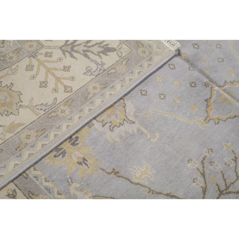 Tapis bleu clair et ivoire noué à la main de haute qualité