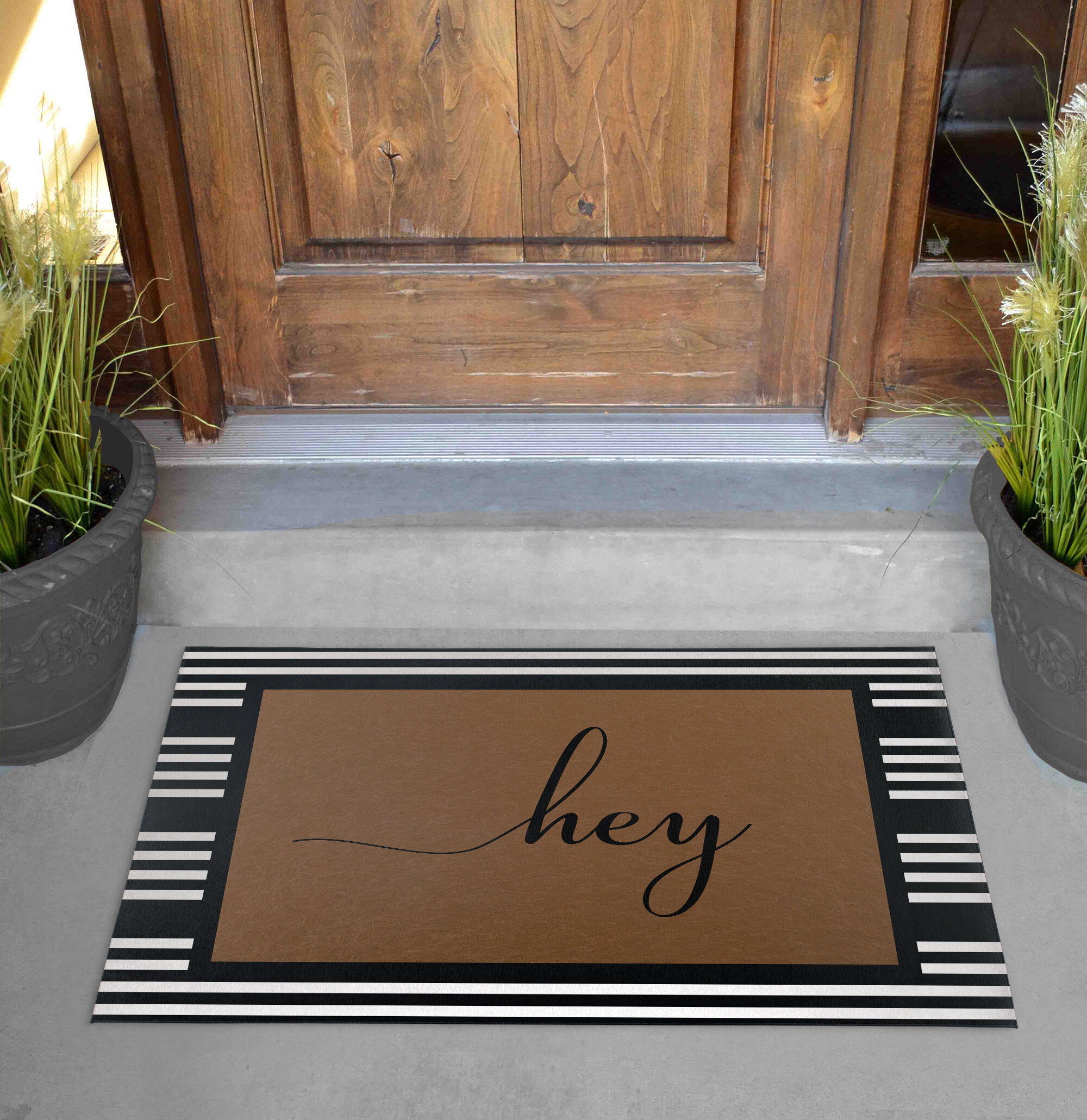 https://assets.wfcdn.com/im/19315888/compr-r85/1535/153592153/beata-non-slip-striped-outdoor-doormat.jpg