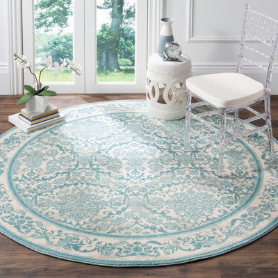 Auriyah Oriental Ivory/Light Blue Area Rug