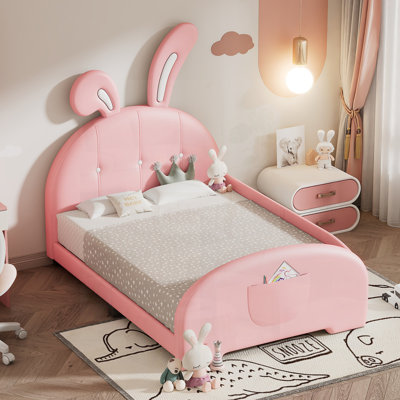 Lit simple princesse en forme de lapin avec tête de lit et pied de lit, parfait pour les chambres d'enfants et les décorations ludiques