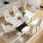 63"Modern Artificial Stone White Curved Black Metal Leg Dining Table -6 People-948996411-953352458