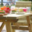 Strader 4 - Person Solid Wood Patio Dining Set Rectangular Table
