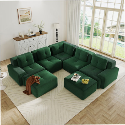 Canapé modulaire modulaire en forme de V à 5 places avec sièges profonds, deux repose-pieds mobiles et revêtement en velours côtelé capitonné pour un confort ultime.