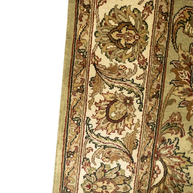 Hand Knotted Wool Oriental Area Rug in Green And Ivory