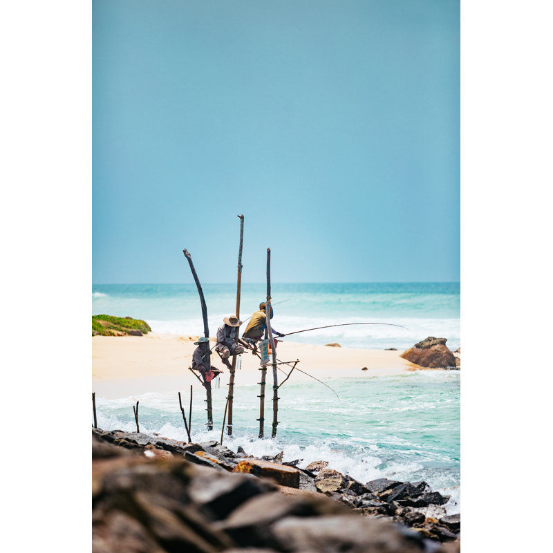 Stilt Fishermen Of Sri Lanka by Andrey Danilovich - No Frame Art Prints on Canvas, 122cm H x 81cm W