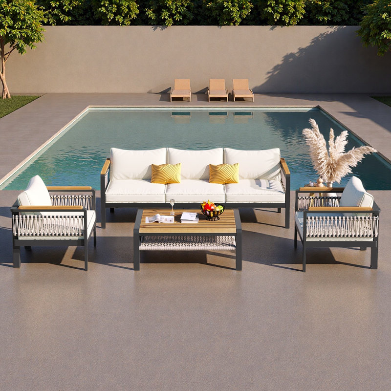 Ensemble de canapé modulaire d'extérieur 4 pièces pour 4 personnes avec ensemble de conversation avec coussins et table basse pour patio