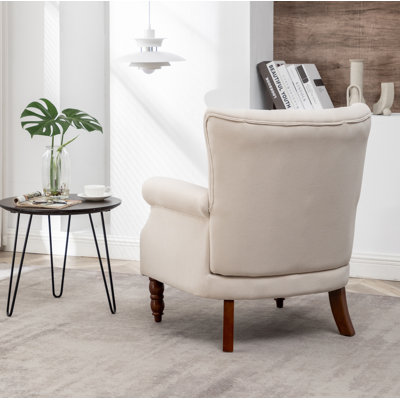 Edelman Upholstered Wingback Chair