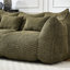 Olive chenille, offrant une chaise élégante et confortable, avec poignée pratique pour un déplacement facile