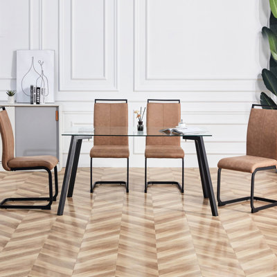 De 4 chaises modernes en brun, dossier haut rembourré avec pieds en tube de métal pour diverses occasions.