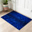 Tapis bleu lavé à la machine-129431023