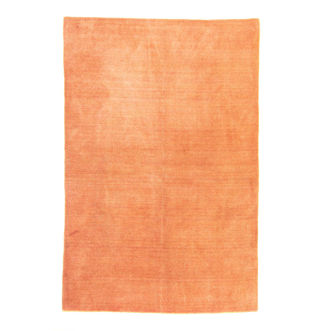 Handgefertigter Teppich Jasie aus Wolle in Orange/Beige