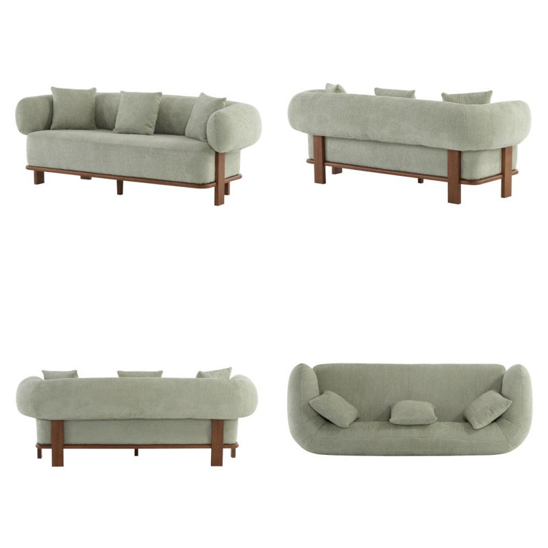 Canapé à accoudoirs arrondis avec design ergonomique et support confortable, parfait pour les décors modernes et Mid-Century.