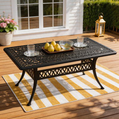Table de salle à manger en fonte d'aluminium avec motif en treillis complexe, résistant aux intempéries pour une utilisation extérieure